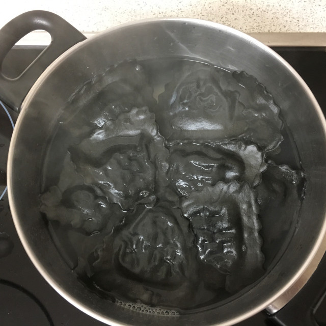 Black pasta cooking