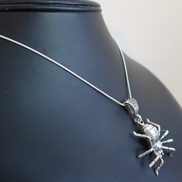 Huge spider pendant shown with a chain (side view)